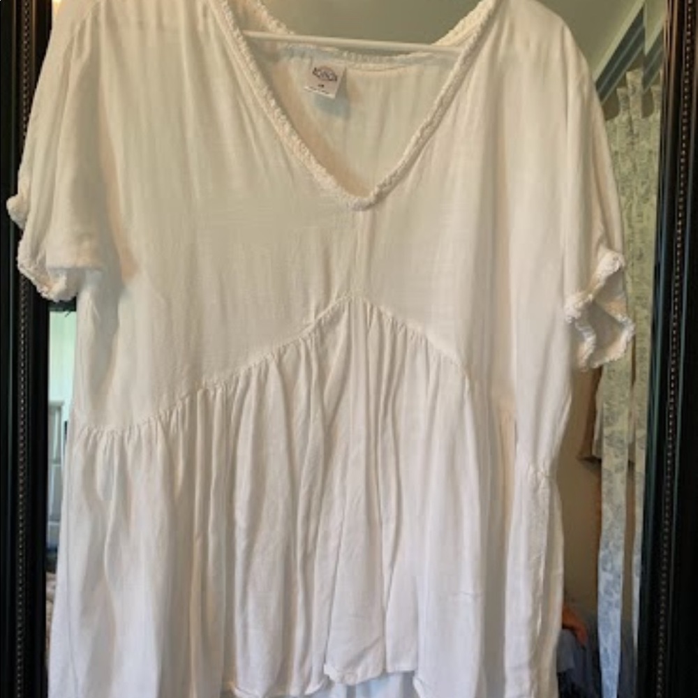 White flowy top